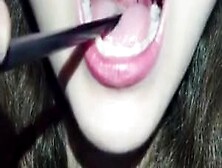 Chinese Girl Uvula (Was She Swallowing Her Saliva With Her Open Mouth At 0:56?)