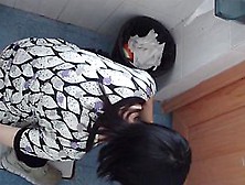 Dark-Haired Asian Babe Pissing In The Public Toilet