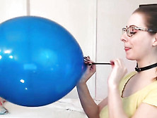Lintilla Blows Up A Big Blue Balloon