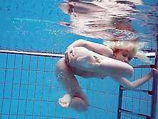 Petite Blonde Teenager Underwater