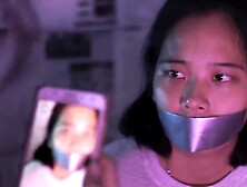 Thai Girl Silver Tape Gagged