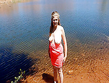 Hot Mom Standing In A Pond