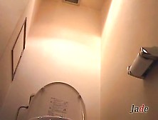 Japanese Bimbos Taking A Piss In The Toilet On Hidden Camera