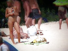Hidden Camera Caught Naked Babe Standing On The Sunny Beach