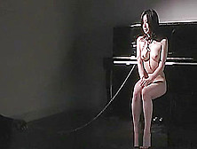 A Bondage Loving Asian Hottie Tied Upside-Down While Sucking