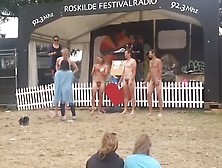 Naked Men At Festival In Front Of Cheerleaders