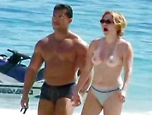 Naked Couple Enjoying Themselves On The Beach