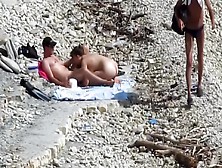 Sensual Girl Jumps On Her Boyfriend's Fat Dick At The Nude Beach