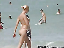Topless Skinny Babe With Cute Tits Runs Away From The Beach.