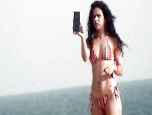 Hispanic Fitness Girl On The Beach Voyeur Clip
