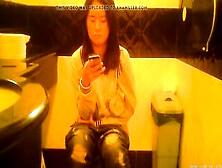 Shaved Chinese Women Taking A Piss