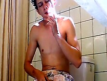 Ian Madrox Smoking A Cigar And Jerking Off In The Bathroom