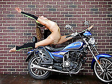 Flexible Russian Chick Exposes Her Private Areas By The Bike
