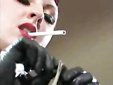 Sexy Girl Smoking In Leather Outfit