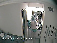 Woman Takes Off Pajama In Bedroom