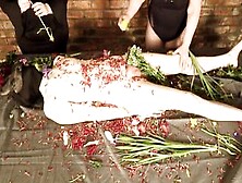 Amazingly Hot Fem Dom Duo Flogs Cheating Sub With Flowers