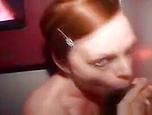 Awesome Looking Red Head Taking Facial Through Glory Hole