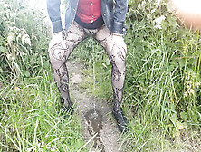 Peeing In Field In Tights