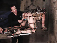 Caged Blondie In Bondage Gets Stimulated With Vibrators