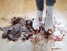 Crushing Chocolate Cake In Well Worn Ballet Flat Shoes And Socks