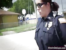 Two Nasty Police Officers Sharing Black Cock Outdoors