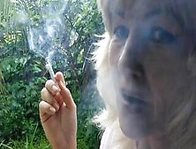 Raining,  Half Nude Blonde Slut Smoking In Garden Outdoor