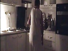 Naughty Mature Woman Gets Naked And Touches Herself In The Kitchen