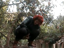 Mature Redhead Pee In The Forest