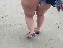 Blonde Milf Walking On Beach In A Thong