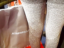 Two Candid Fit Asses In Grey Yoga Pants Walking