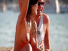 Tall Brunette With Big Tits On Topless Beach