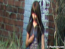 Sensual Brunette Is Pissing On The Hidden Cam