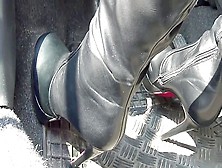 Smoking Hot Girl In Provocative Black Boots Does Some Pedal Pumping In The Sport Car