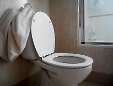 Slim Girl Pooping Over Toilet