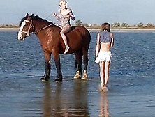 Mila And Katy Share A Horse