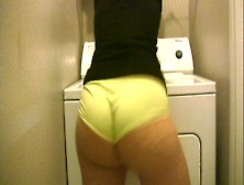 Big Booty Brunette Shakes Her Ass In The Laundry