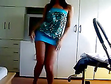 Brunette Chick Wearing A Miniskirt Dances In Front Of A Webcam