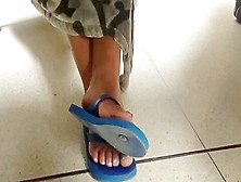 Sexy Voyeur Feet In Blue Flip Flops Getting Naughty At The Office
