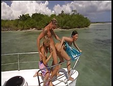 Boat Trip Leads To Threesome On The Beach