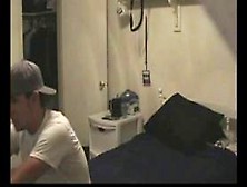 Guy Is Caught By A Spy Cam In The Room.