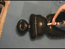 Slave Is In The Inflatable Rubbersuit