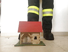 Firefighter Stomping Wooden House