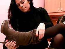 Two Sexy Girls Take Turns Taking Each Other's Boots Off
