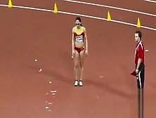 Raven-Haired Athletic Babe Competes In Long Jump