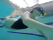 Girl Underwater In Tight Swimsuit