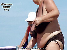Fine Enormous Titted Old Lady In Bikini At The Beach