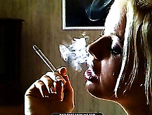 Blonde In A Sheer Top Sheds Her Black Heels When Sitting Down For A Rewarding Smoke.