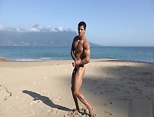 Muscular Guy Solo On The Beach