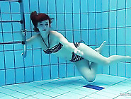 Big Breasts Redhead Strips Off Her Bikini In The Pool
