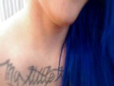 Closeup Squirt Blue Hair Punk Teen With Tattoos And Glasses